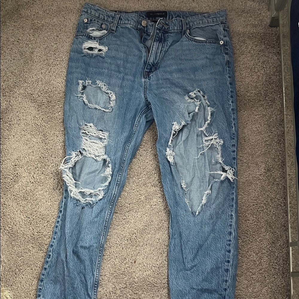 Distressed Blue Jeans